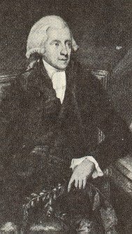 Engraved portrait of William Withering, in a wig and dark coat, seated and turned towards the viewer