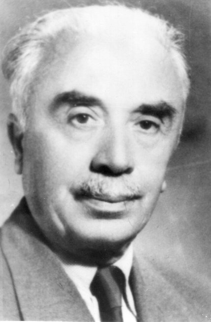 Portrait of Professor P. Nikolov (1894 to 1990), a man in a suit with short white hair, in black and white